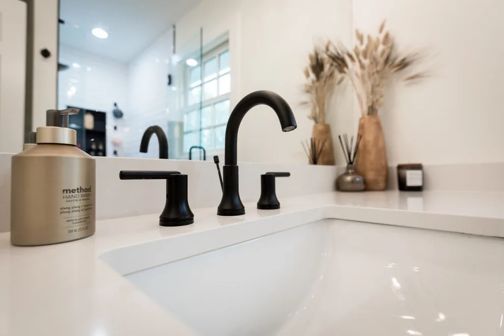 Brass and Black Bold Bathroom by NextGen Remodeling LLC - Photo 7