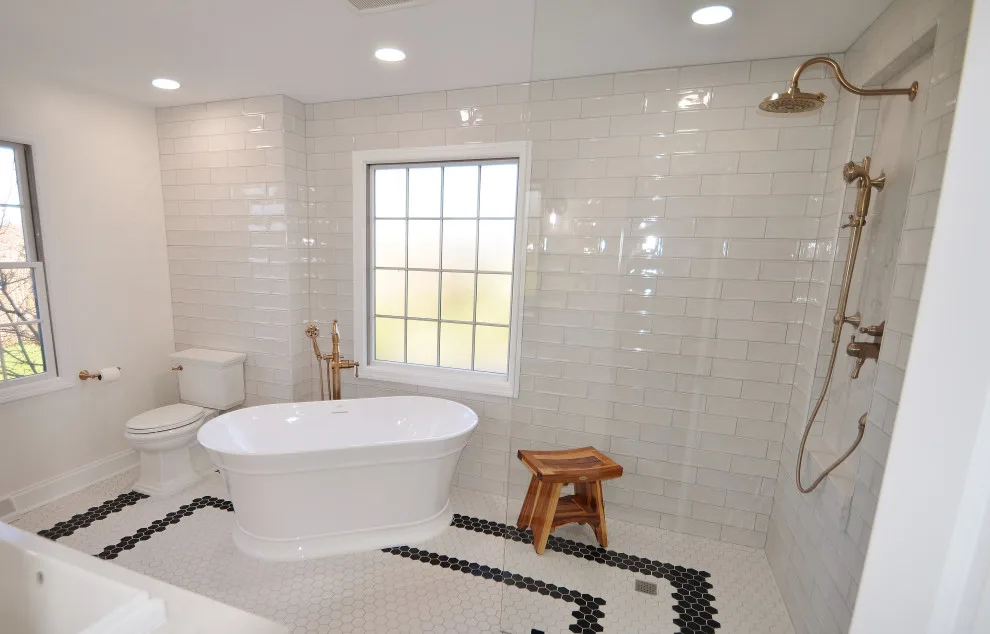 Monochrome Luxury Bathroom by Conrad Kitchen, Bath And Remodeling LLC - Photo 7
