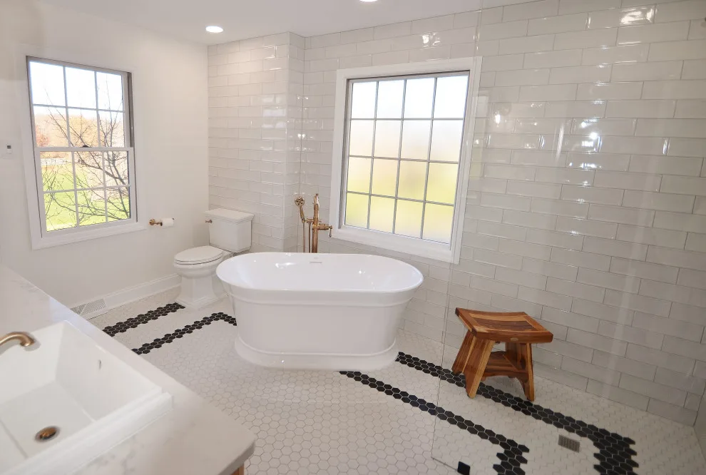 Monochrome Luxury Bathroom by Conrad Kitchen, Bath And Remodeling LLC - Photo 9
