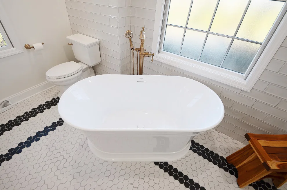 Monochrome Luxury Bathroom by Conrad Kitchen, Bath And Remodeling LLC - Photo 5