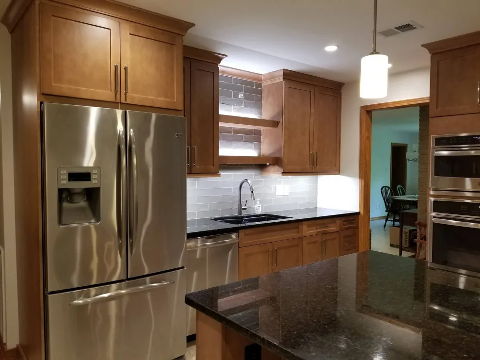 Dark Countertops Kitchen by Home Run Remodeling & Construction, Inc. - Photo 2