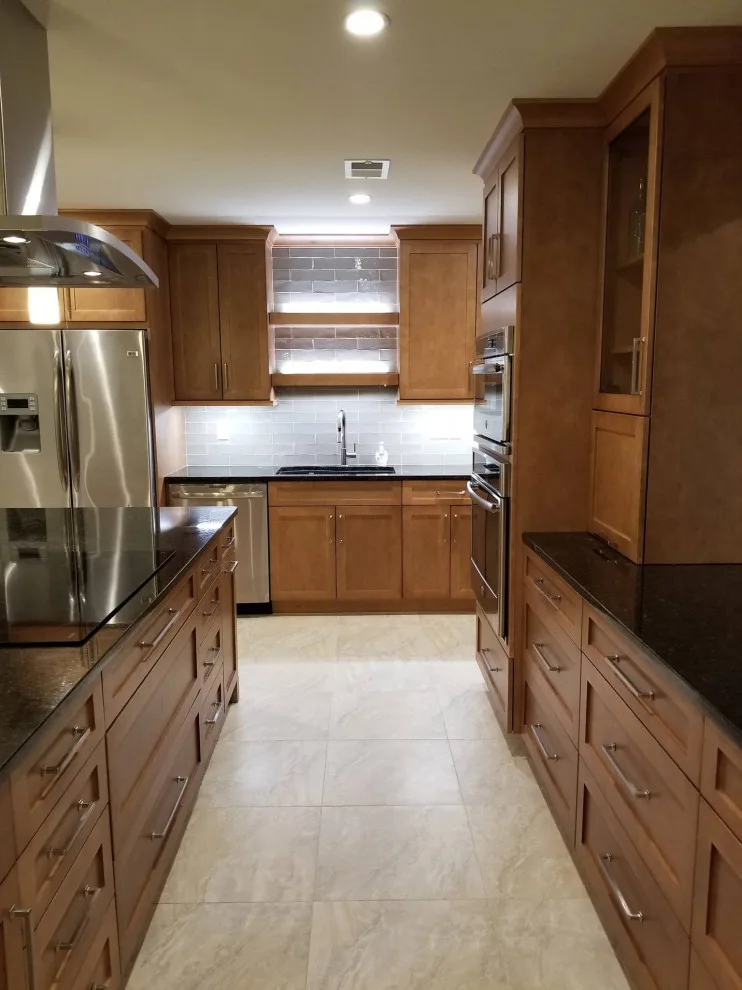 Dark Countertops Kitchen by Home Run Remodeling & Construction, Inc. - Photo 5