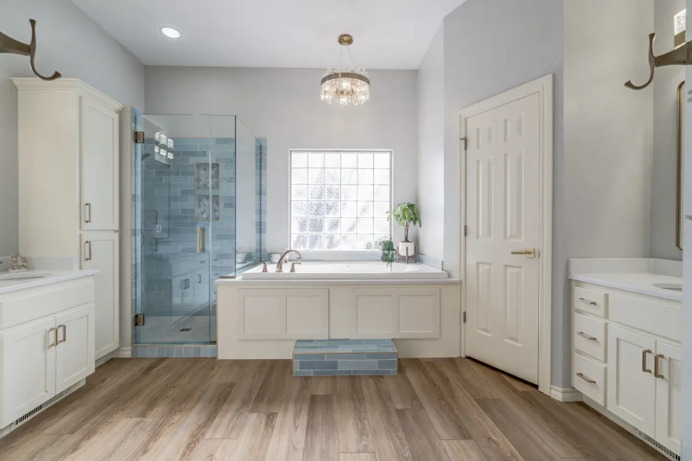 Azure and Ivory Primary Bathroom by Heritage Renovations - Photo 4