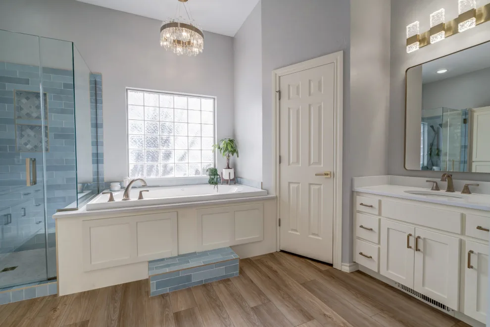 Azure and Ivory Primary Bathroom by Heritage Renovations - Photo 9