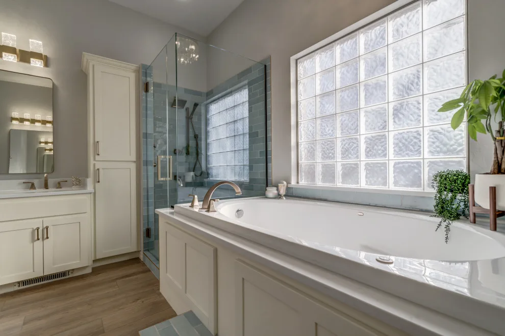 Azure and Ivory Primary Bathroom by Heritage Renovations - Photo 13