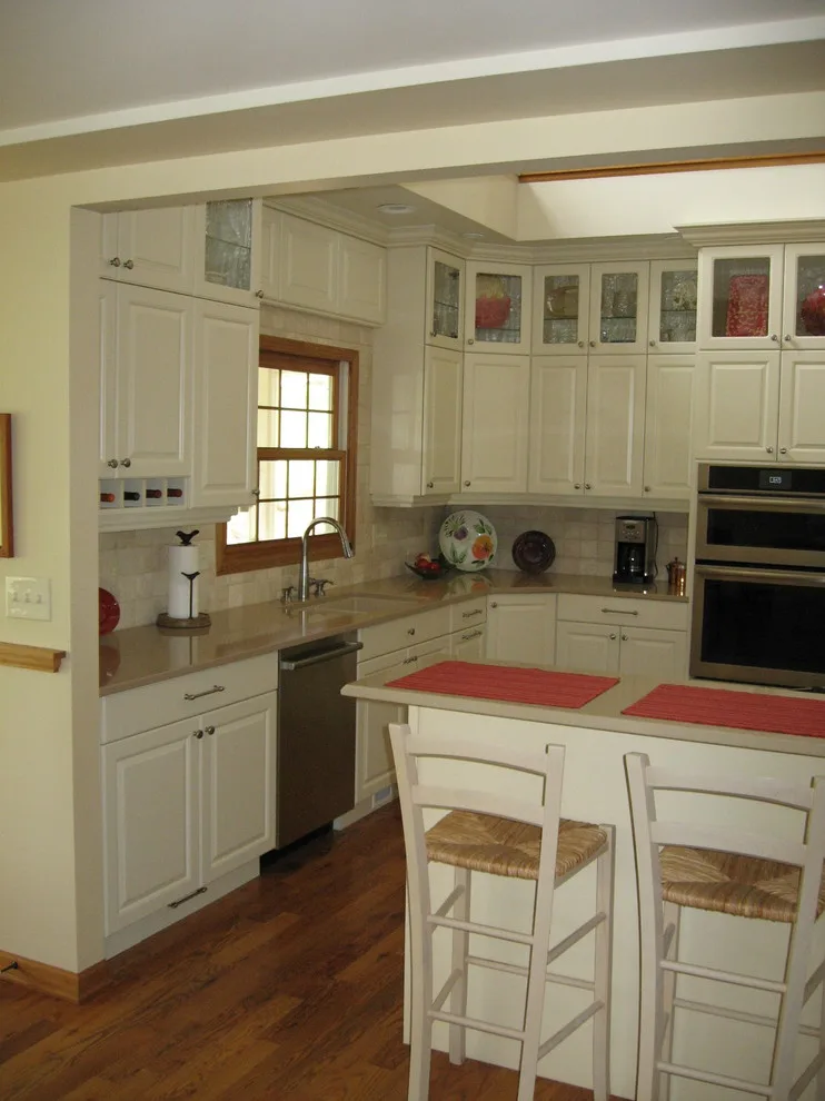 Radiant White Kitchen Renovation by Kitchen & Bath Design Center - Photo 20
