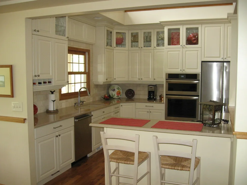 Radiant White Kitchen Renovation by Kitchen & Bath Design Center - Photo 14
