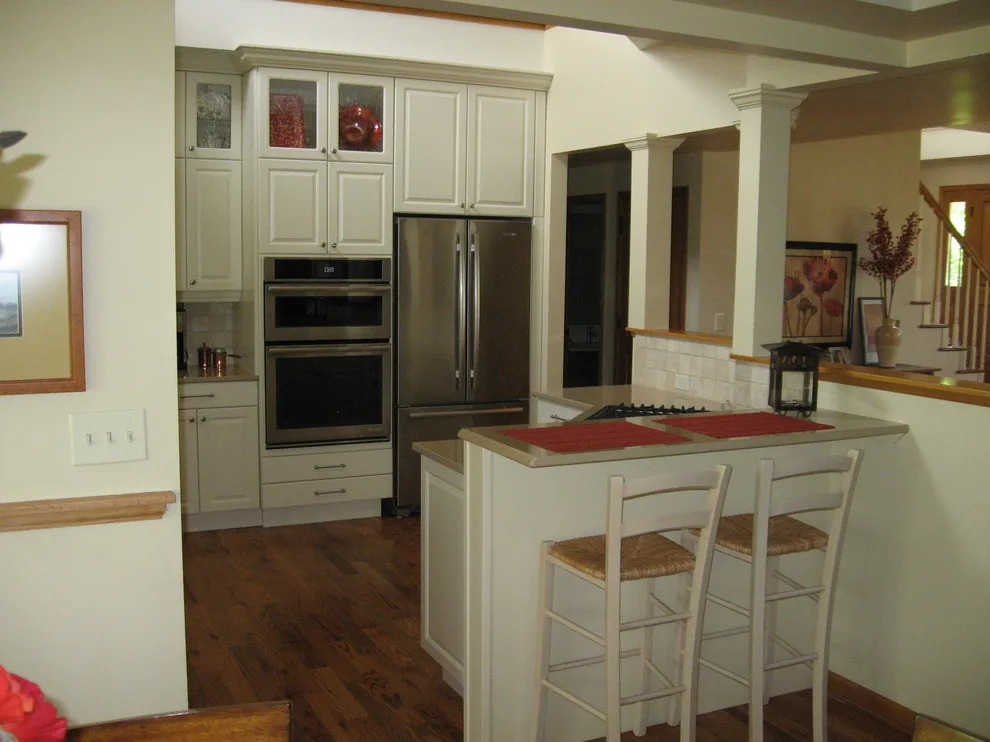 Radiant White Kitchen Renovation by Kitchen & Bath Design Center - Photo 12