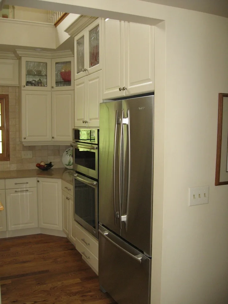 Radiant White Kitchen Renovation by Kitchen & Bath Design Center - Photo 9