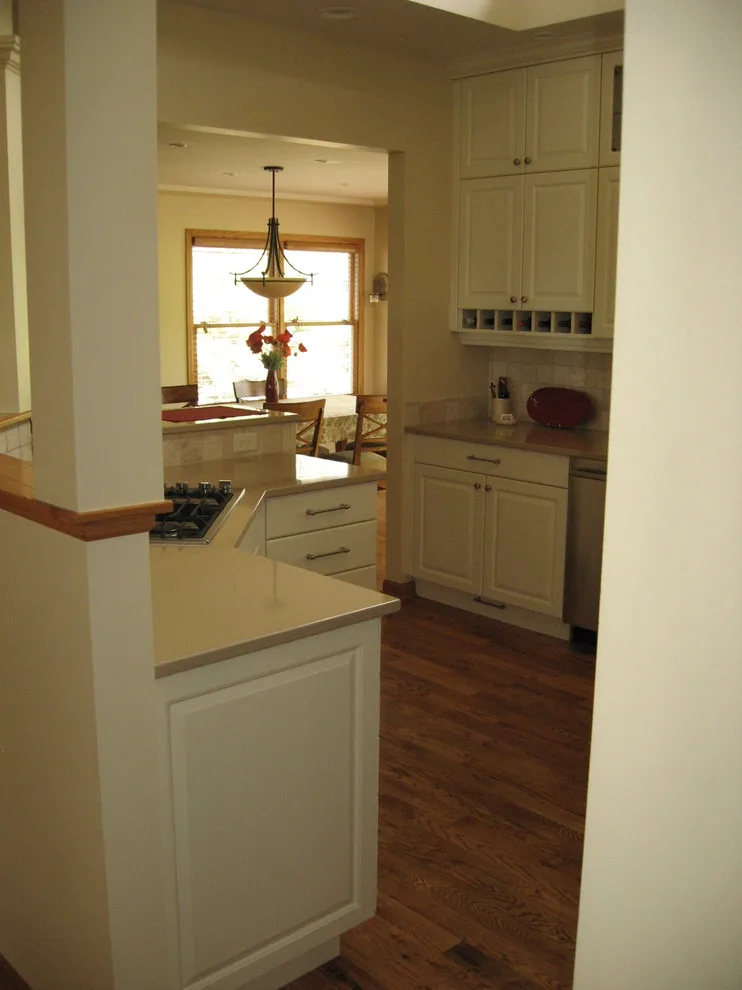 Radiant White Kitchen Renovation by Kitchen & Bath Design Center - Photo 15