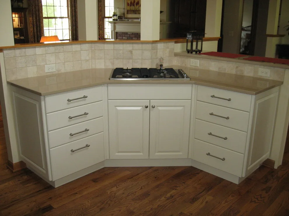 Radiant White Kitchen Renovation by Kitchen & Bath Design Center - Photo 25