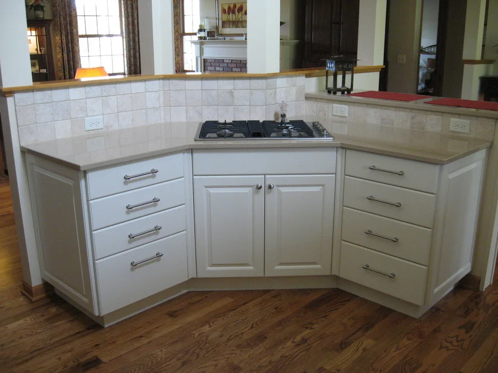 Radiant White Kitchen Renovation by Kitchen & Bath Design Center - Photo 8