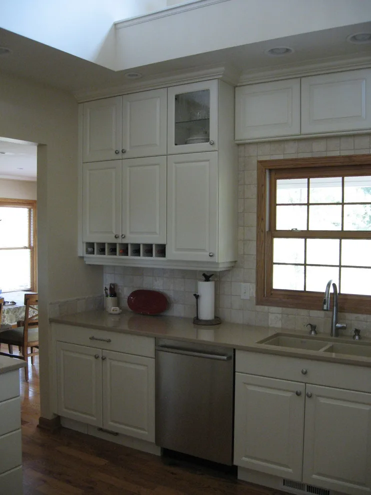Radiant White Kitchen Renovation by Kitchen & Bath Design Center - Photo 26