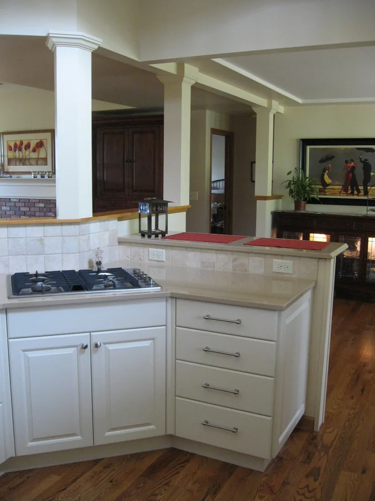 Radiant White Kitchen Renovation by Kitchen & Bath Design Center - Photo 11