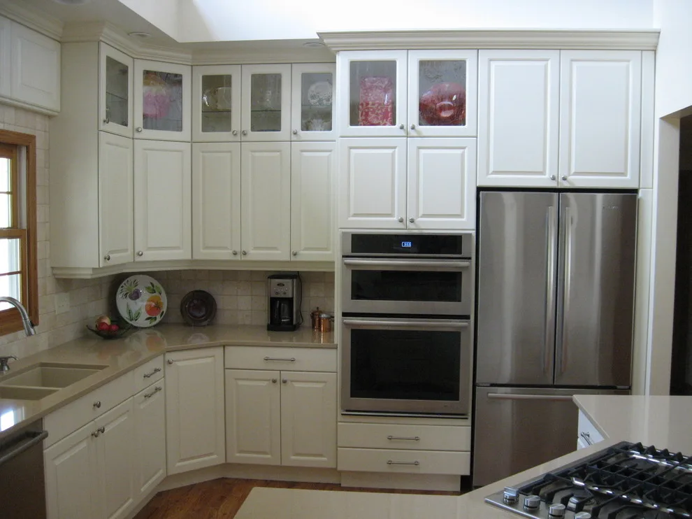 Radiant White Kitchen Renovation by Kitchen & Bath Design Center - Photo 22