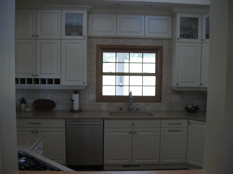 Radiant White Kitchen Renovation by Kitchen & Bath Design Center - Photo 23
