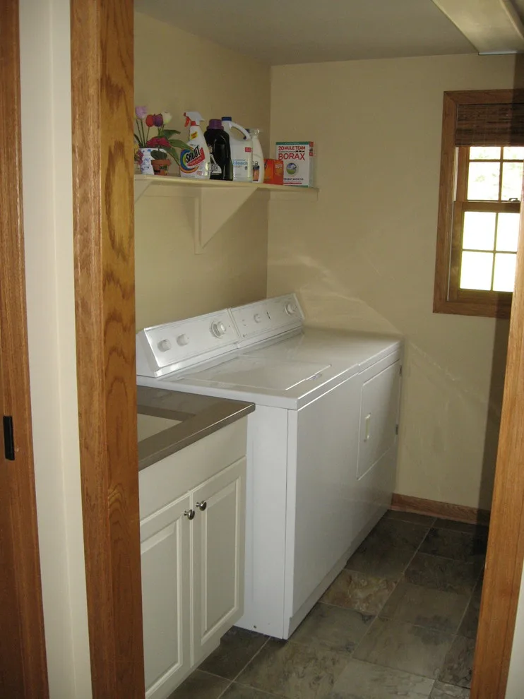 Radiant White Kitchen Renovation by Kitchen & Bath Design Center - Photo 18