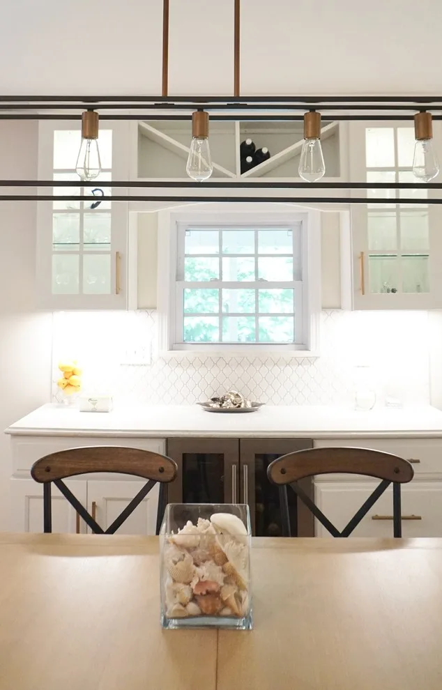 Luminous White Kitchen Renovation by Affordable Kitchens & Baths - Photo 9