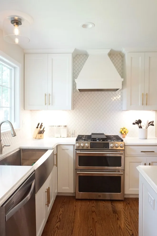 Luminous White Kitchen Renovation by Affordable Kitchens & Baths - Photo 10