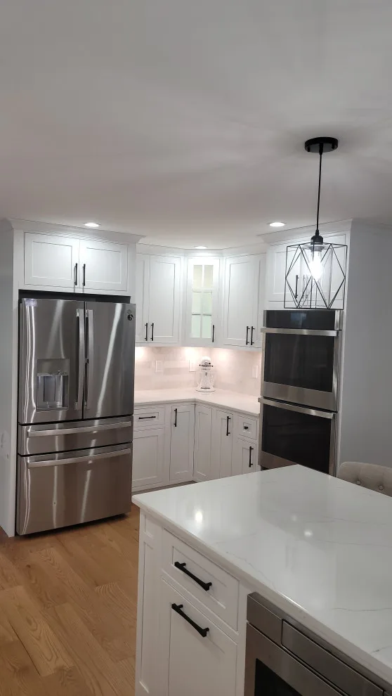 Kitchen Renovation in Brown by Taylor And Stevens Cabinetry - Photo 9
