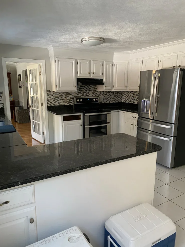 Kitchen Renovation in Brown by Taylor And Stevens Cabinetry - Photo 7