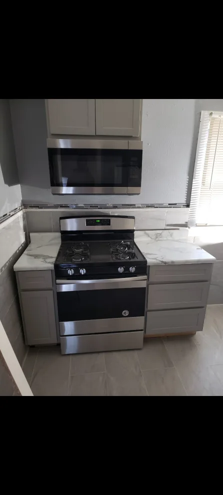 Kitchen Renovation by Construction One - Photo 8