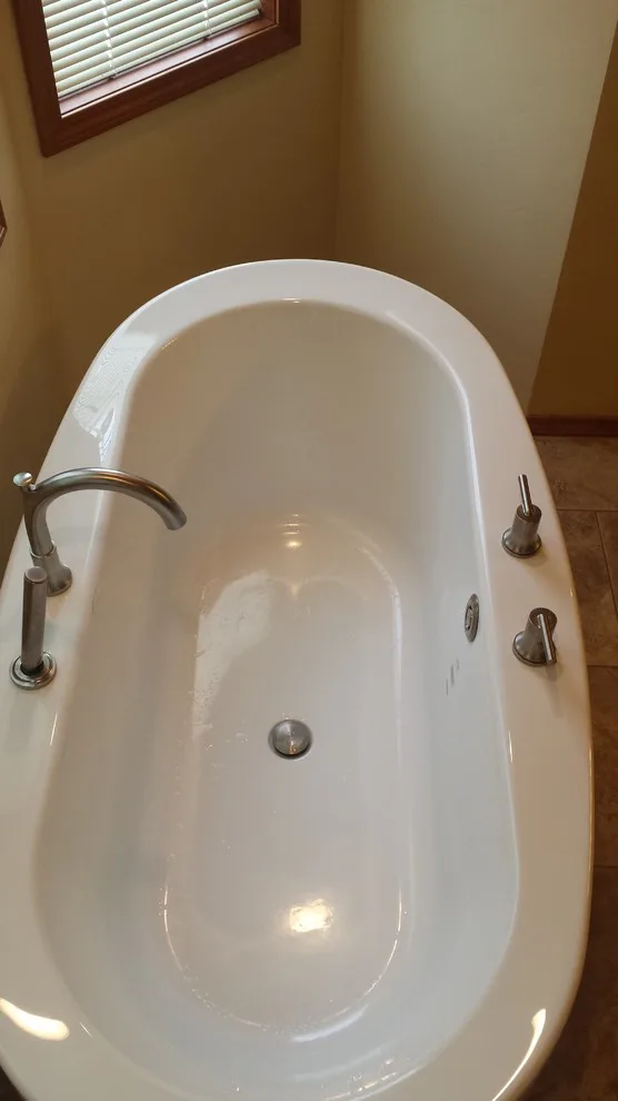 Revamping a Worn-Out 80's Master Bathroom by Bade Brothers Building Company - Photo 2