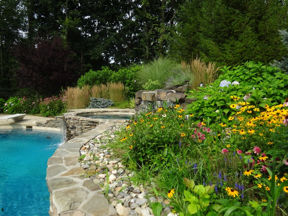 A Lush Backyard Poolscape by Apple Tree Landscapes, Inc. - Photo 15