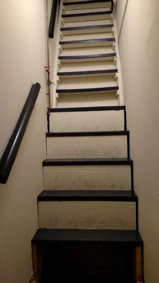 Brownstone walk-up storage ladder by A.M.Carter Construction Inc - Photo 7