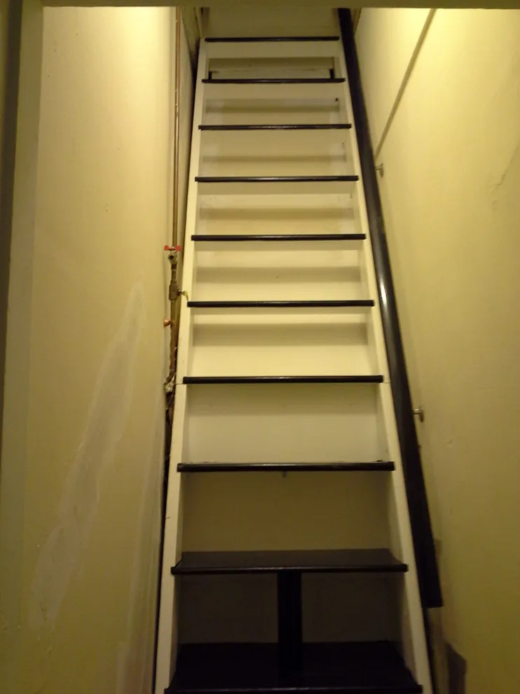 Brownstone walk-up storage ladder by A.M.Carter Construction Inc - Photo 4