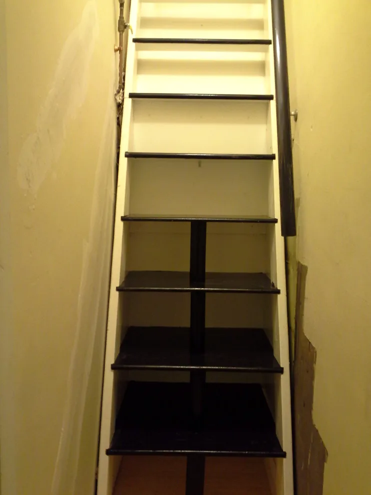 Brownstone walk-up storage ladder by A.M.Carter Construction Inc - Photo 2