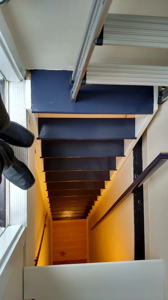 Brownstone walk-up storage ladder by A.M.Carter Construction Inc - Photo 3