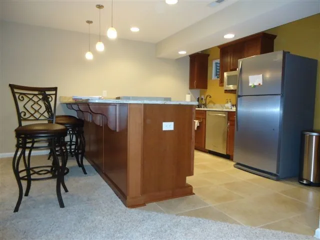GuyCo - Walden Glen Basement Renovation by The Guy Corporation - Photo 3
