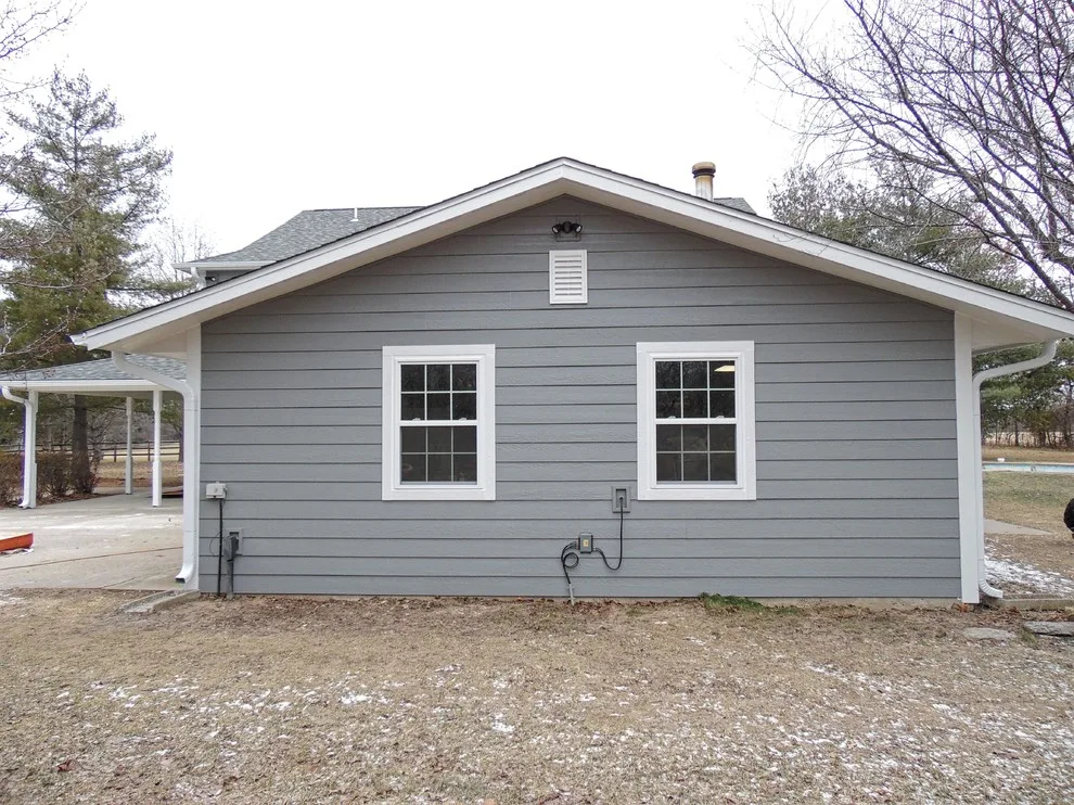 Grey Siding Upgrade from Wood Siding by Trueson Exteriors - Photo 2