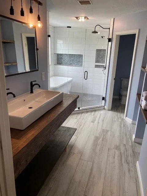Transformative Bathroom Renovation by XP Construction - Photo 6
