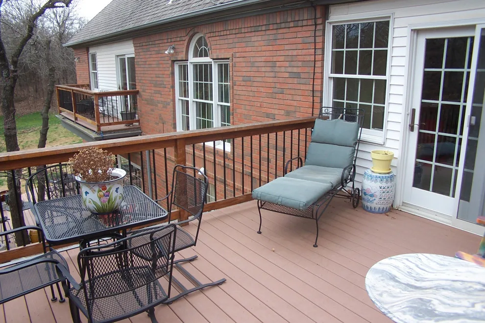 Two-Level Deck Featuring Dual Fireplaces by Contracting In Carpentry LLC - Photo 2