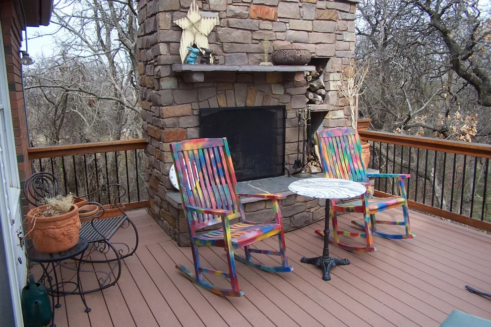 Two-Level Deck Featuring Dual Fireplaces by Contracting In Carpentry LLC - Photo 3