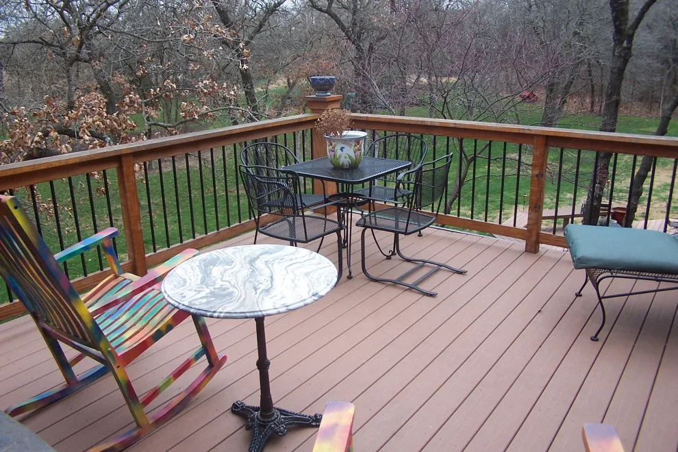 Two-Level Deck Featuring Dual Fireplaces by Contracting In Carpentry LLC - Photo 7