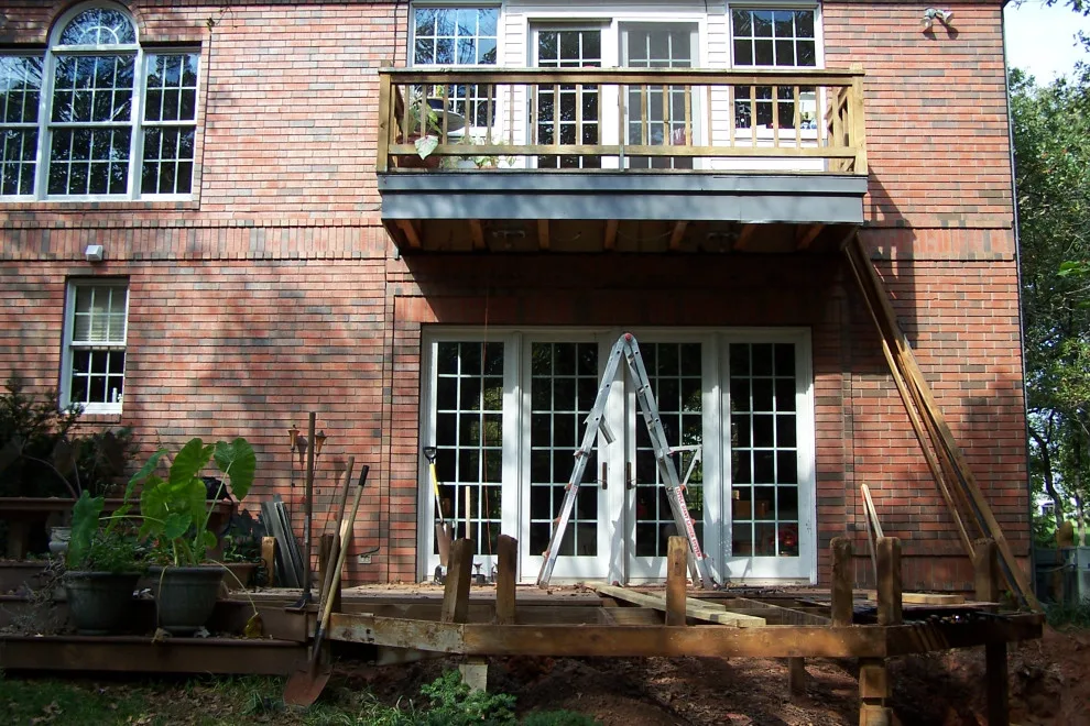 Two-Level Deck Featuring Dual Fireplaces by Contracting In Carpentry LLC - Photo 11