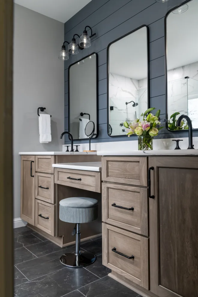 Stylish bathroom featuring smart storage solutions and artistic design elements by Liston Design Build - Photo 2