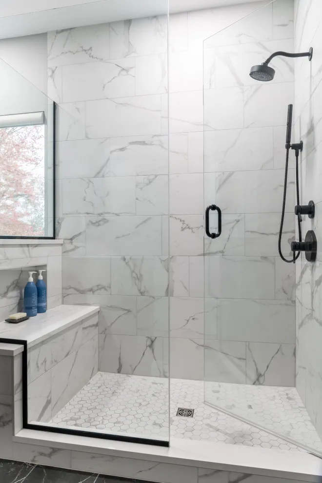 Stylish bathroom featuring smart storage solutions and artistic design elements by Liston Design Build - Photo 3