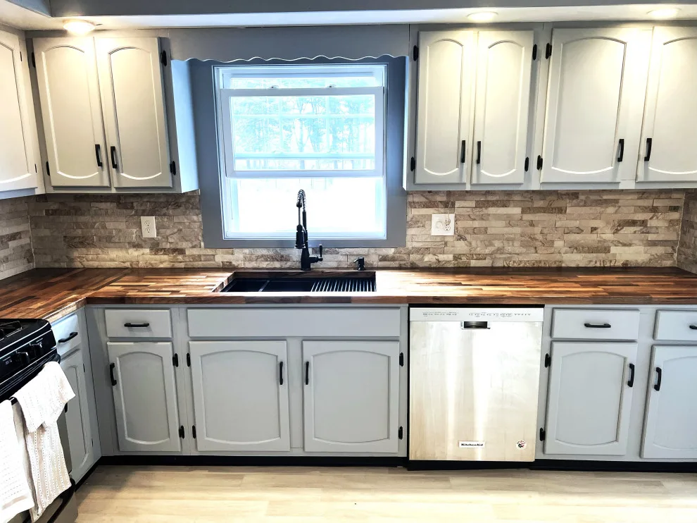 A kitchen renovation with textured elements by Elite Renovation LLC Rhode Island - Photo 2