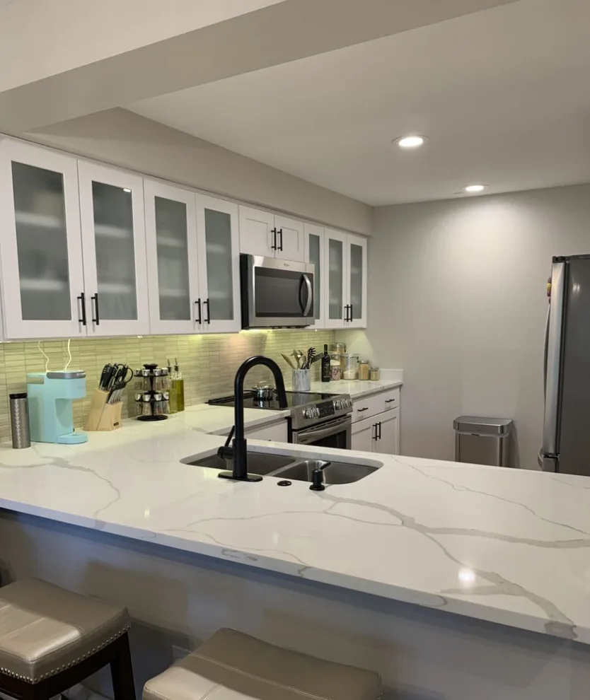 Contemporary White Kitchen Renovation by Wise Choice Construction - Photo 5