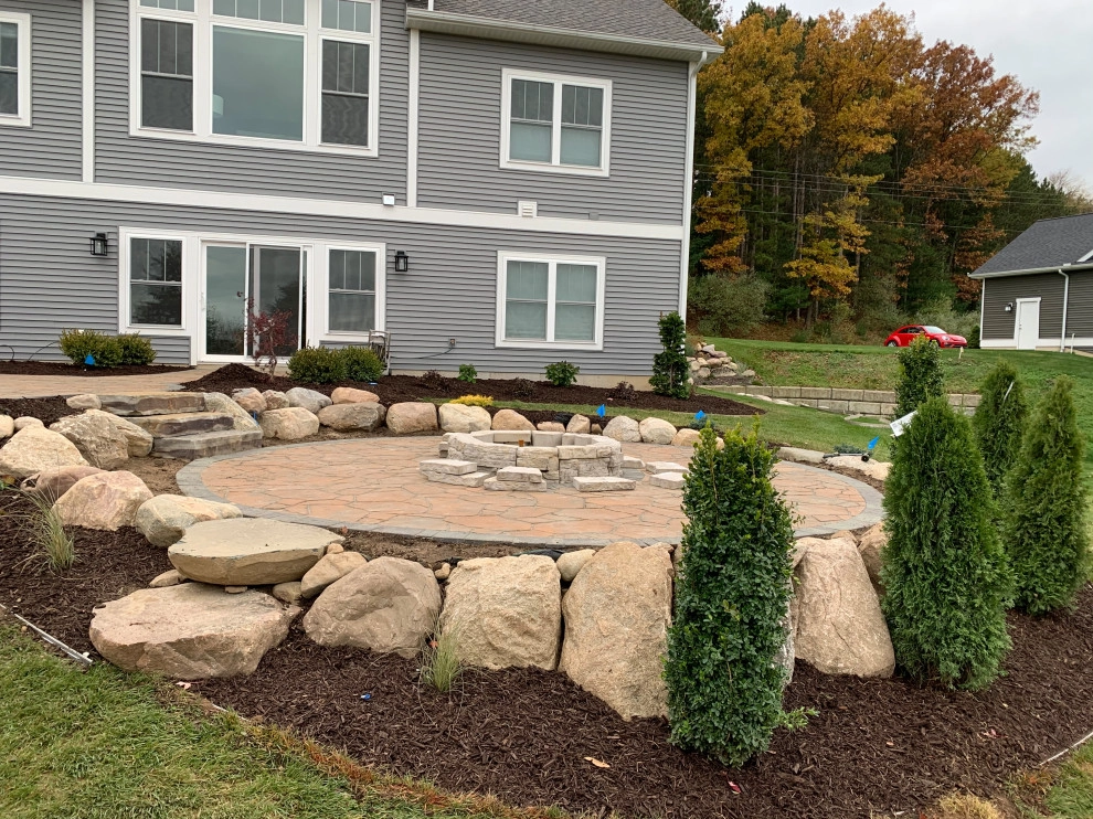 Bi-Level Outdoor Living Space by Omega Brick & Landscaping - Photo 11