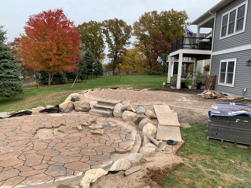Bi-Level Outdoor Living Space by Omega Brick & Landscaping - Photo 4