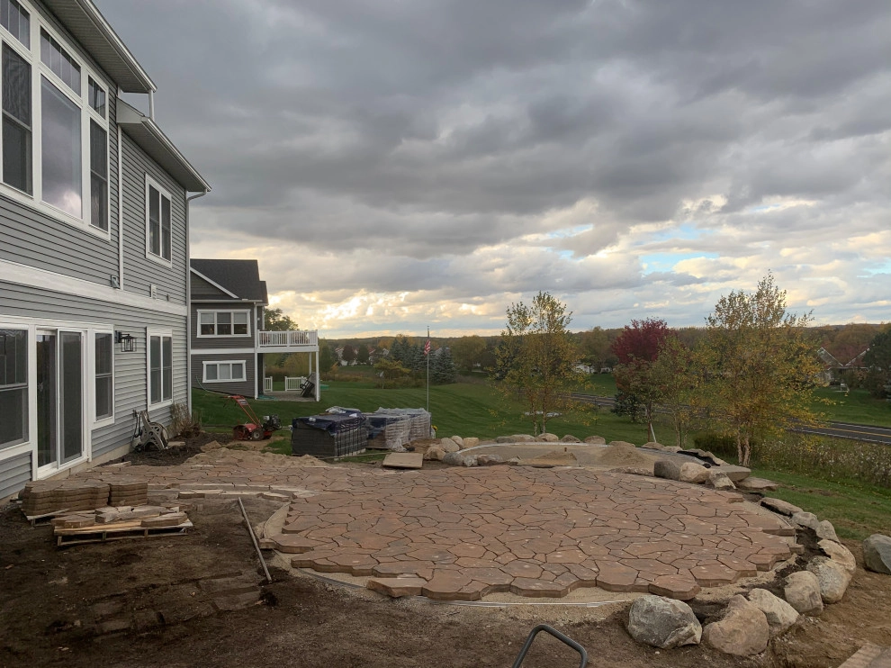 Bi-Level Outdoor Living Space by Omega Brick & Landscaping - Photo 10