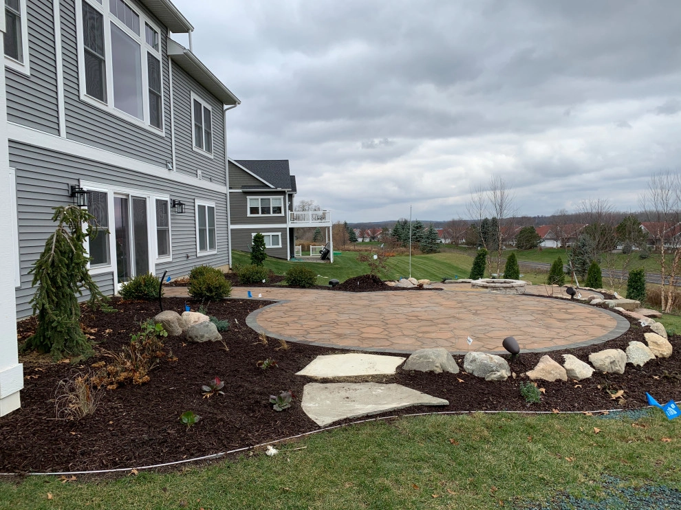 Bi-Level Outdoor Living Space by Omega Brick & Landscaping - Photo 6