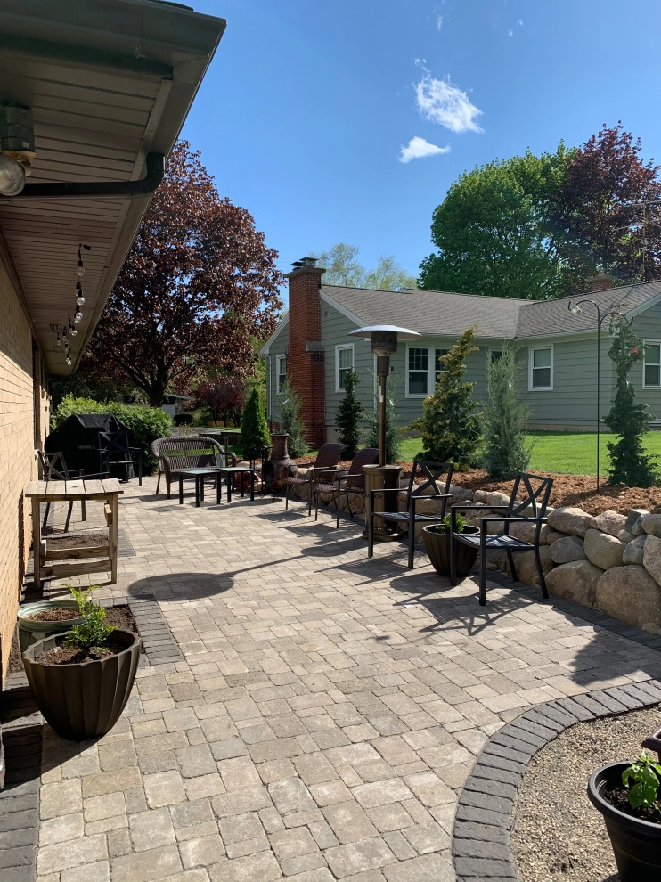 Narrow Outdoor Living Space by Omega Brick & Landscaping - Photo 2