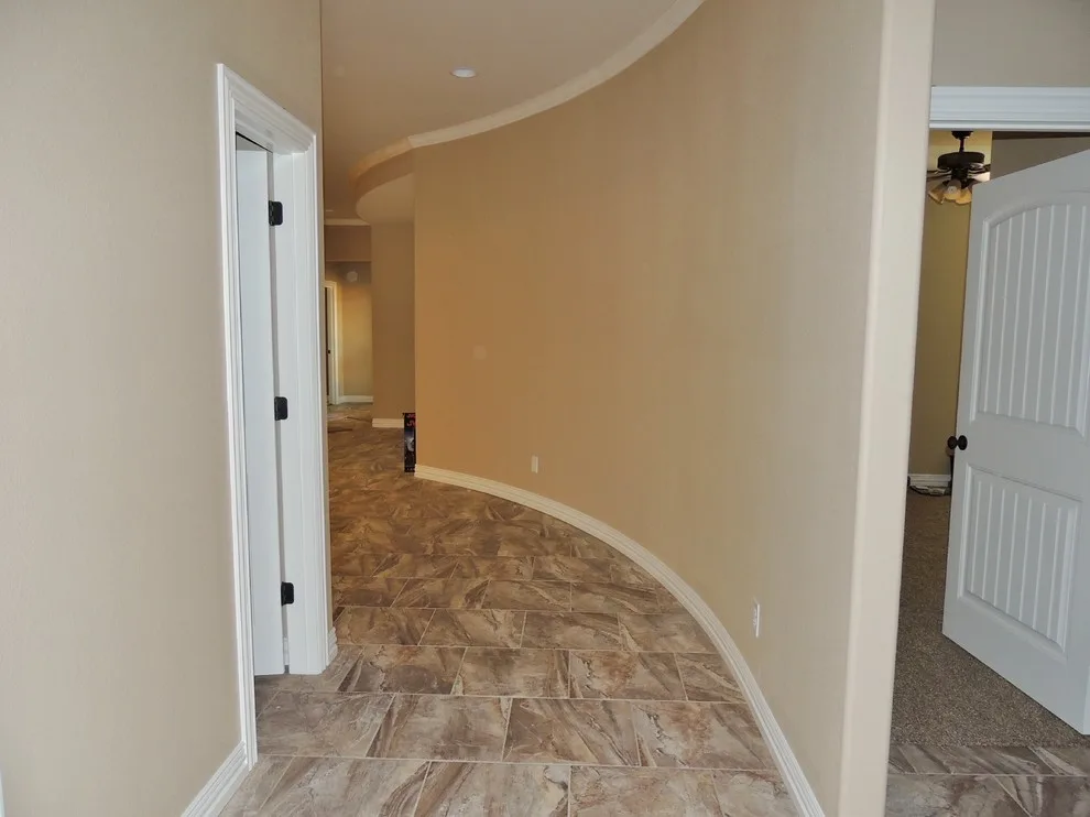 Trim, Staircase, Pantry, and Additional Features by Harmon & Holcomb Homes - Photo 10