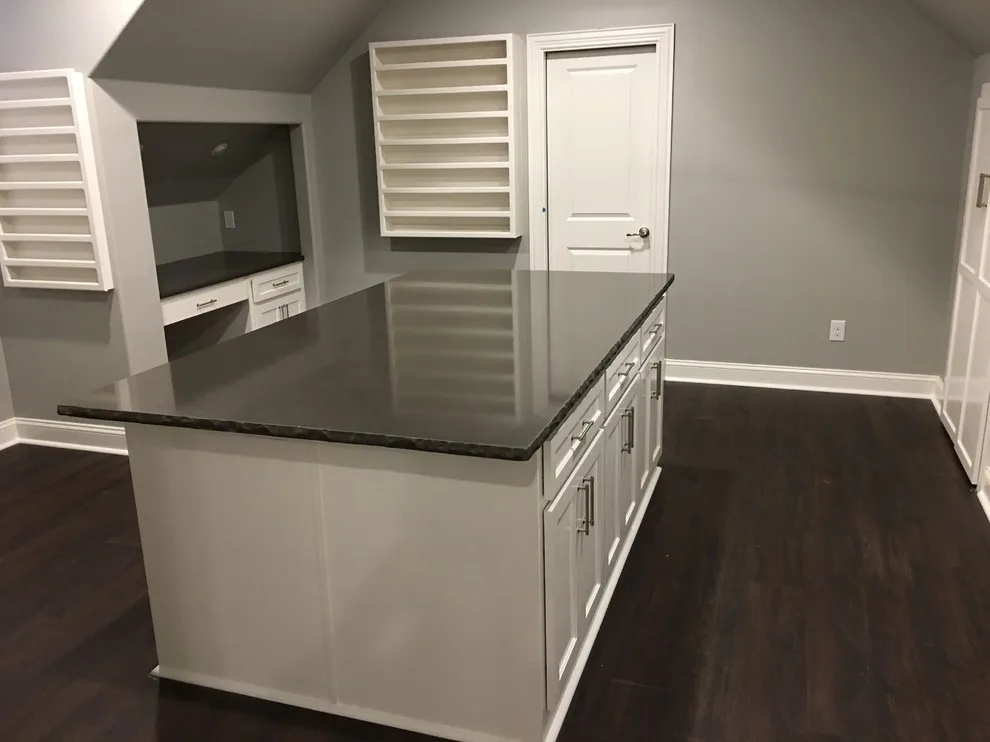 Trim, Staircase, Pantry, and Additional Features by Harmon & Holcomb Homes - Photo 4
